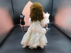 celluloid ten half doll white bk